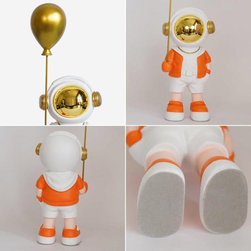 Buy Astronaut Kiddo Showpiece - Orange Showpieces from Vaaree