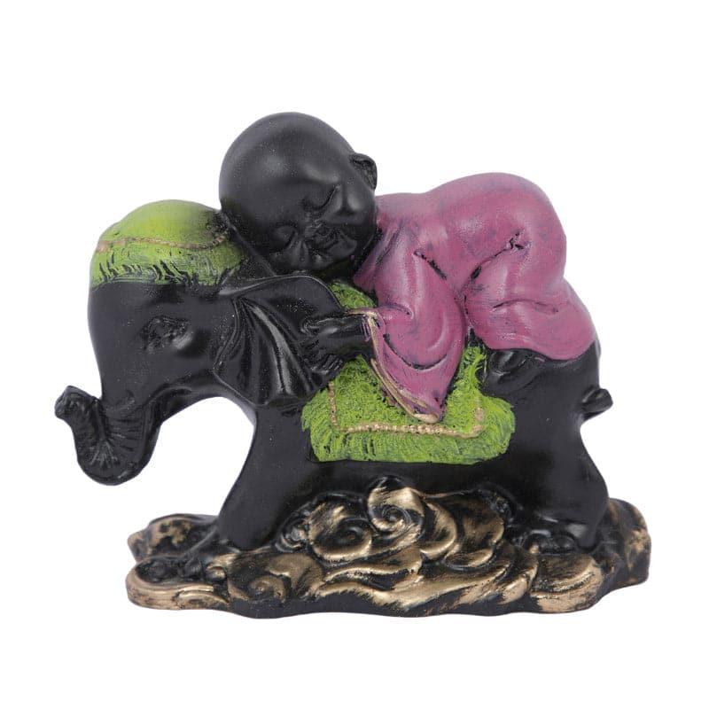 Buy Baby Monk Hug Showpiece Showpieces from Vaaree