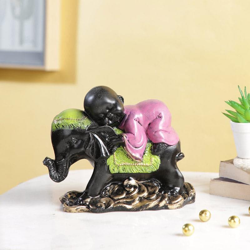 Buy Baby Monk Hug Showpiece Showpieces from Vaaree