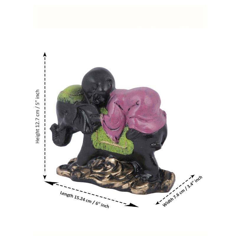 Buy Baby Monk Hug Showpiece Showpieces from Vaaree