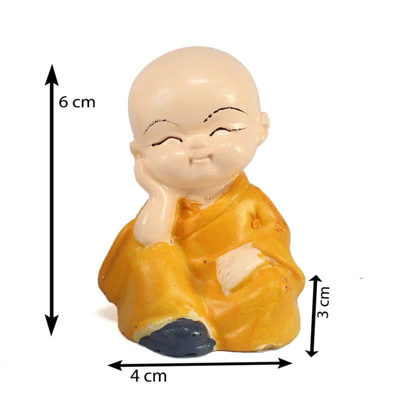 Buy Showpieces - Baby Monk Showpiece at Vaaree online