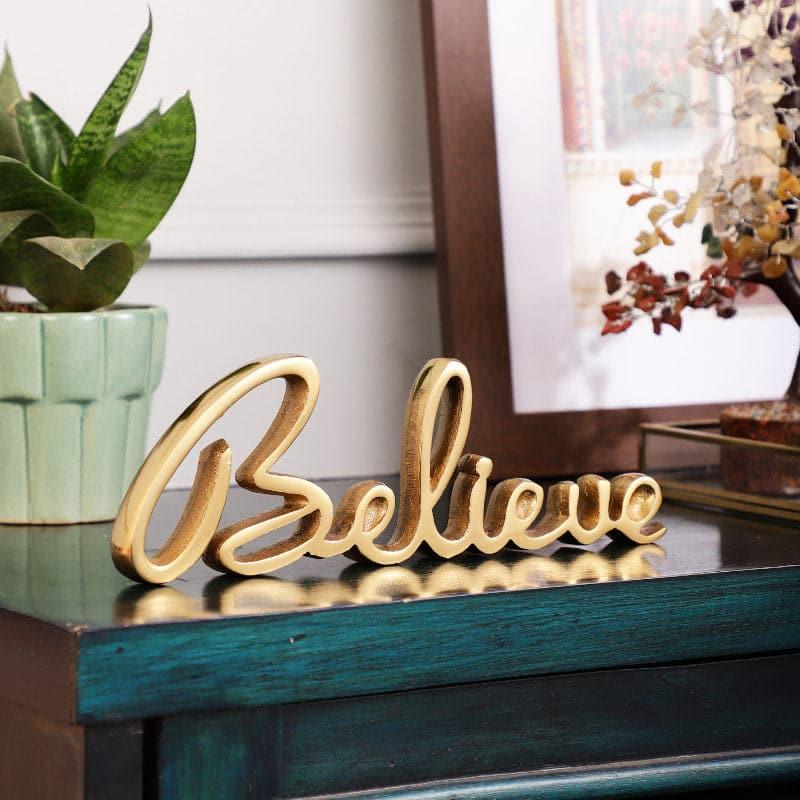 Buy Believe Loop Typography Showpiece - Gold Showpieces from Vaaree