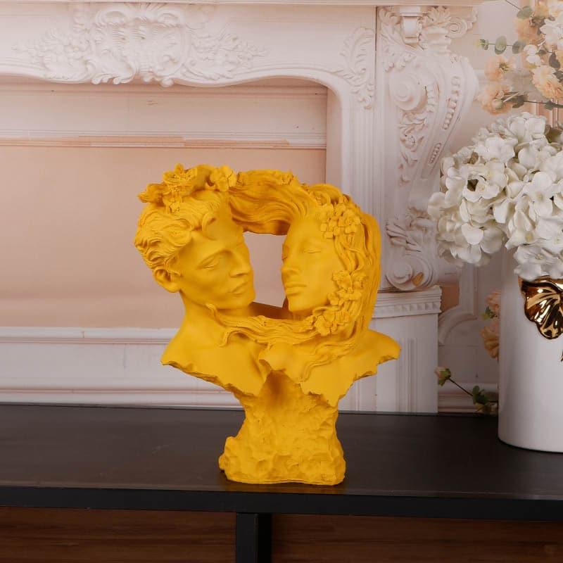 Buy Bonded Bliss Couple Showpiece - Yellow Showpieces from Vaaree