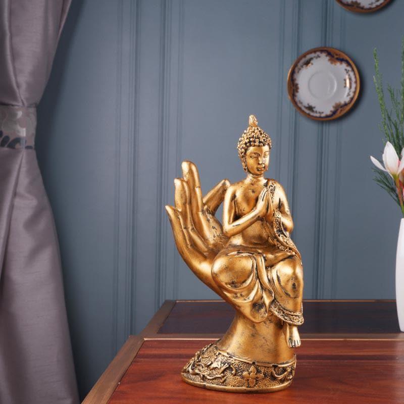 Buy Buddha Sitting On Palm I Showpieces from Vaaree