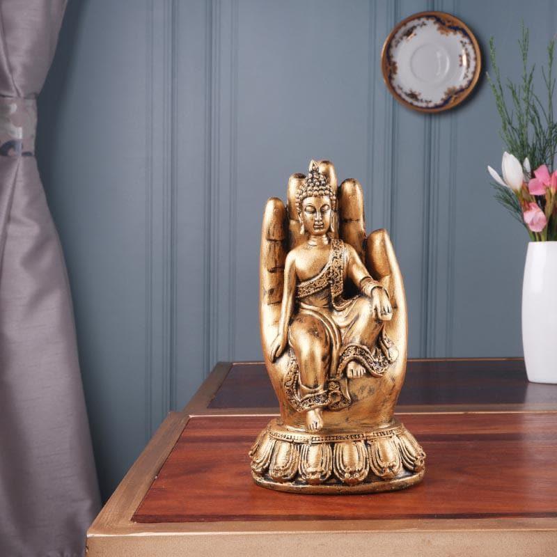 Buy Buddha Sitting On Palm III Showpieces from Vaaree