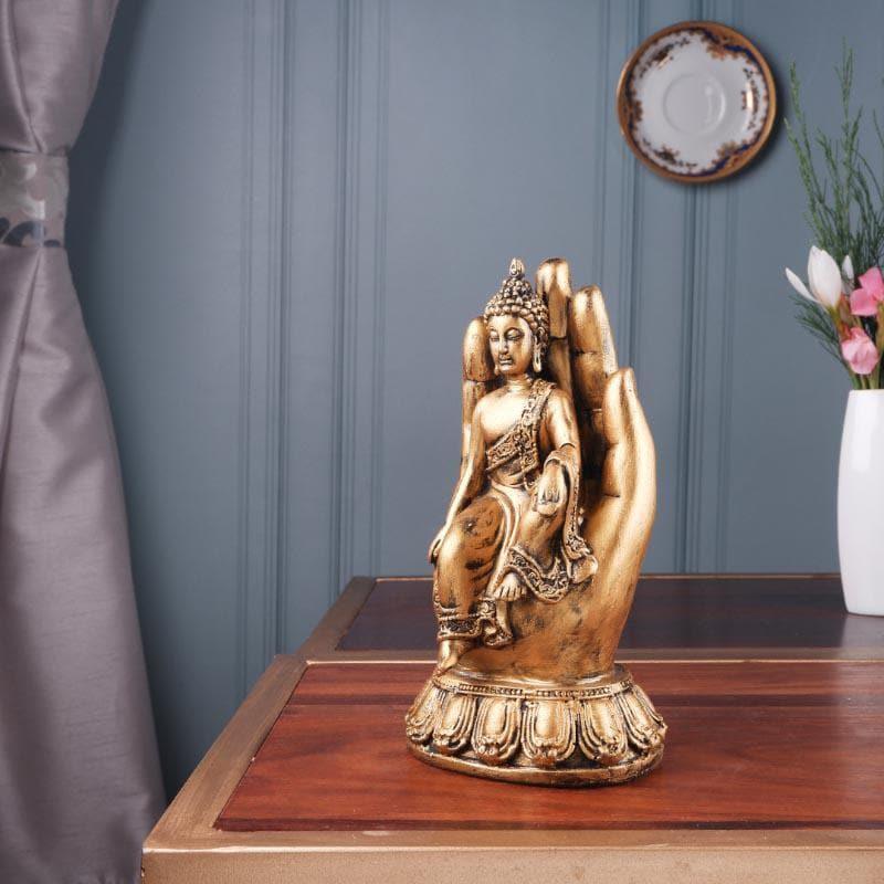 Buy Buddha Sitting On Palm III Showpieces from Vaaree