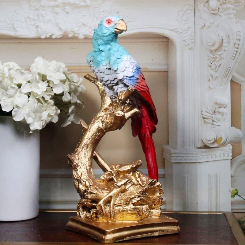 Buy Budgie Parrot Whimsy Showpiece - Blue & Red Showpieces from Vaaree