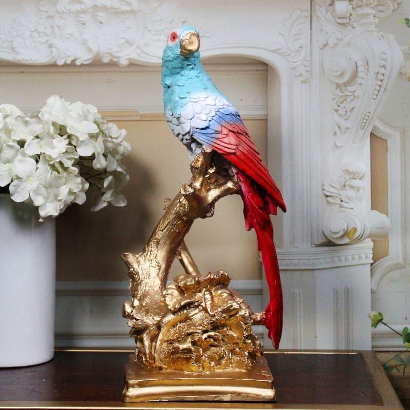 Buy Budgie Parrot Whimsy Showpiece - Blue & Red Showpieces from Vaaree