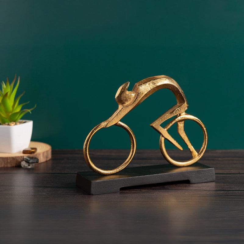 Buy Cyclist Circus Showpiece - Gold Showpieces from Vaaree