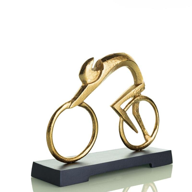 Buy Cyclist Circus Showpiece - Gold Showpieces from Vaaree