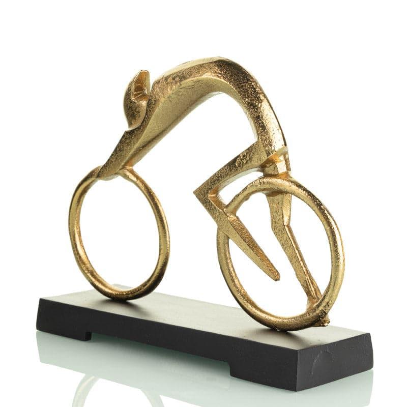 Buy Cyclist Circus Showpiece - Gold Showpieces from Vaaree