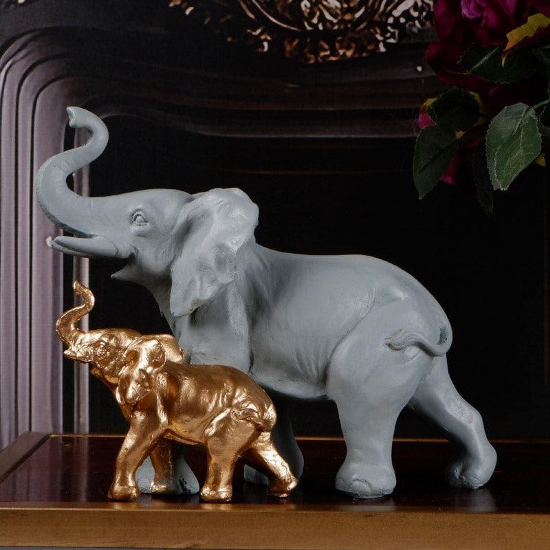 Buy Ellie & Kids Elephant Showpiece - Grey & Gold Showpieces from Vaaree