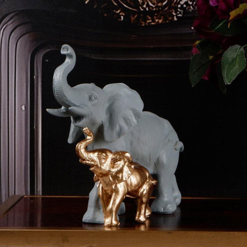 Buy Ellie & Kids Elephant Showpiece - Grey & Gold Showpieces from Vaaree