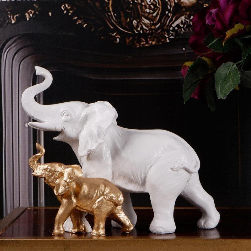 Buy Ellie & Kids Elephant Showpiece - White & Gold Showpieces from Vaaree