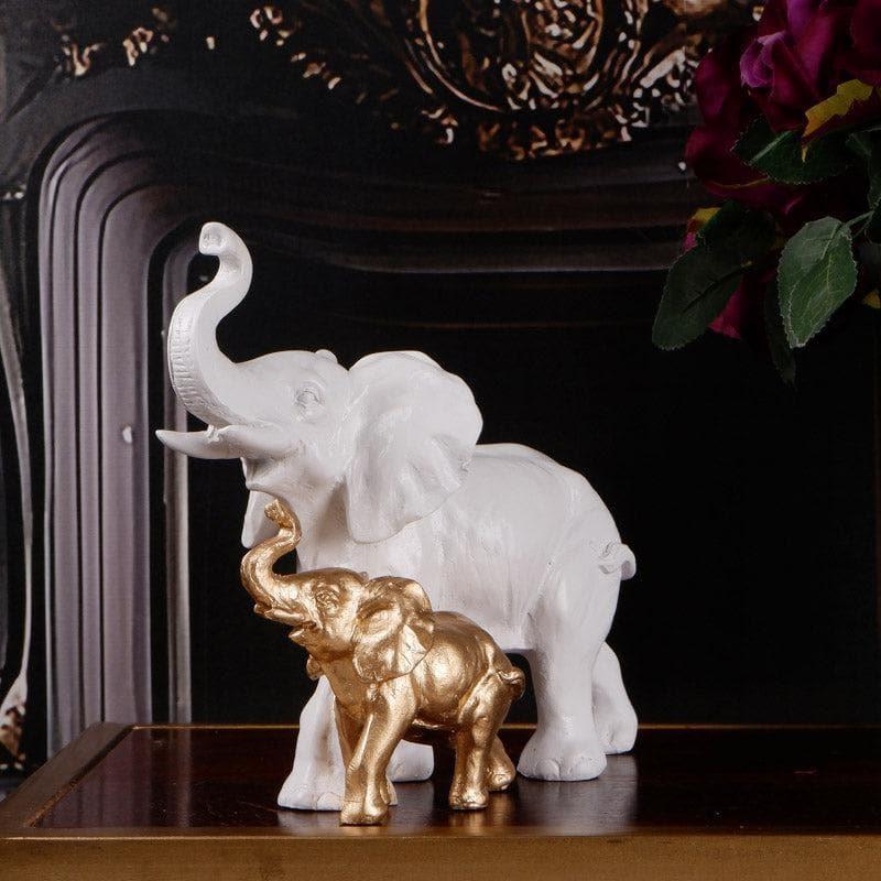 Buy Ellie & Kids Elephant Showpiece - White & Gold Showpieces from Vaaree