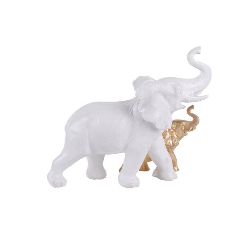 Buy Ellie & Kids Elephant Showpiece - White & Gold Showpieces from Vaaree