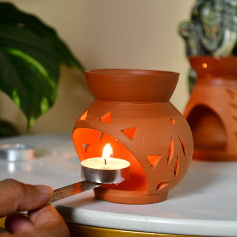 Buy Flora Terracotta Oil Diffuser Showpiece from Vaaree