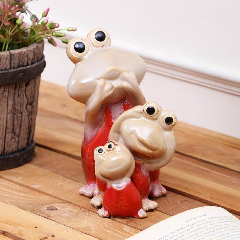 Buy Showpieces - Freaky Frogs Figurine at Vaaree online