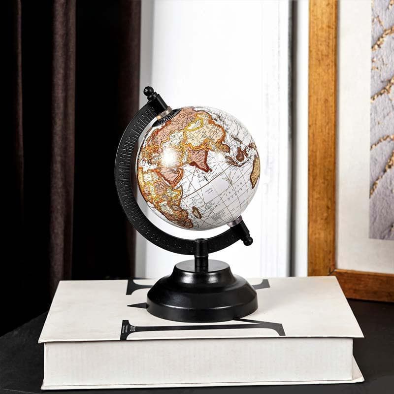 Buy Gullivers Travels Globe - White Showpieces from Vaaree