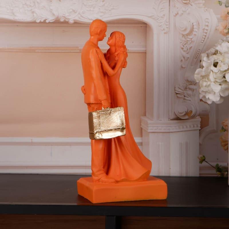 Buy It's The Moment Couple Showpiece - Orange Showpieces from Vaaree