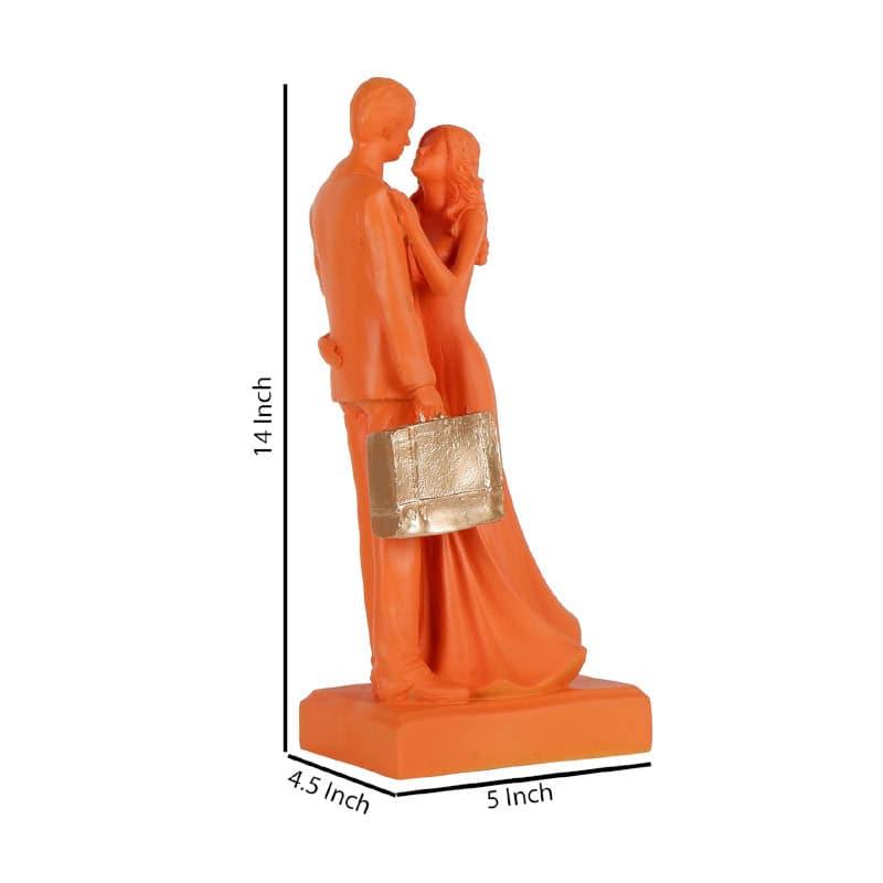 Buy It's The Moment Couple Showpiece - Orange Showpieces from Vaaree