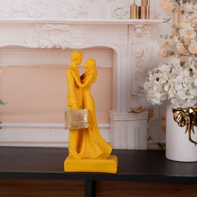 Buy It's The Moment Couple Showpiece - Yellow Showpieces from Vaaree