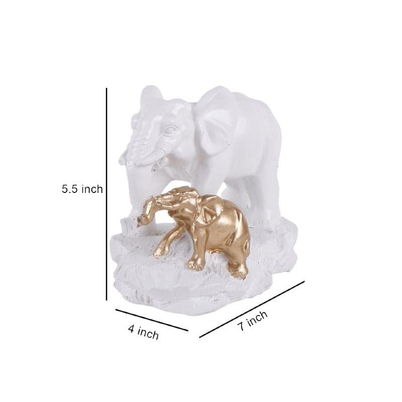 Buy Jumbo Walk Showpiece - White & Gold Showpieces from Vaaree