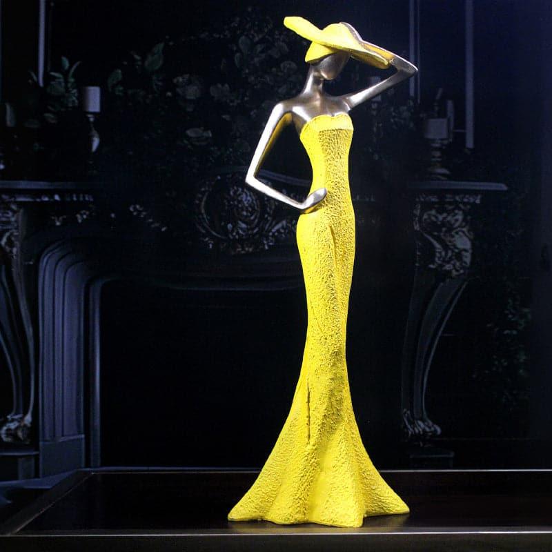 Buy Lady Pose Showpiece - Yellow Showpieces from Vaaree