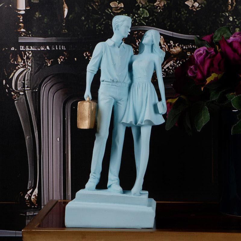 Buy Let's Go Shopping Couple Showpiece - Blue Showpieces from Vaaree