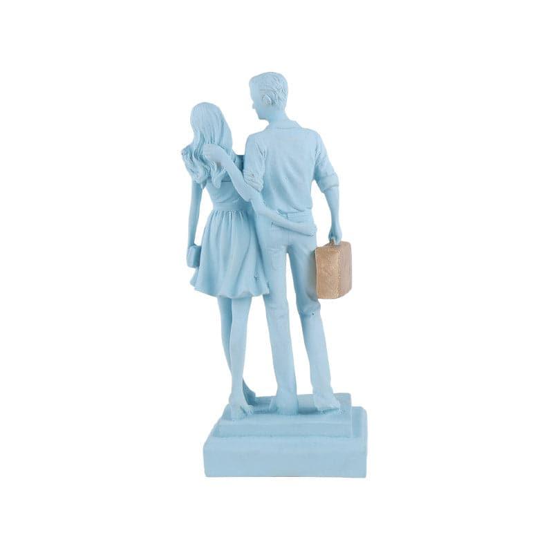 Buy Let's Go Shopping Couple Showpiece - Blue Showpieces from Vaaree