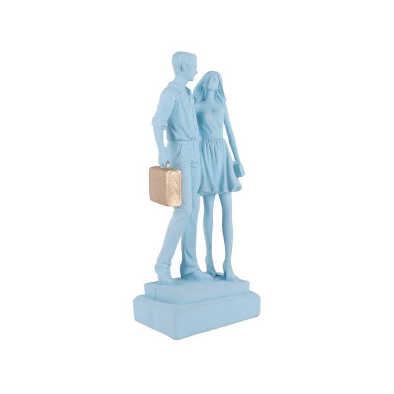 Buy Let's Go Shopping Couple Showpiece - Blue Showpieces from Vaaree