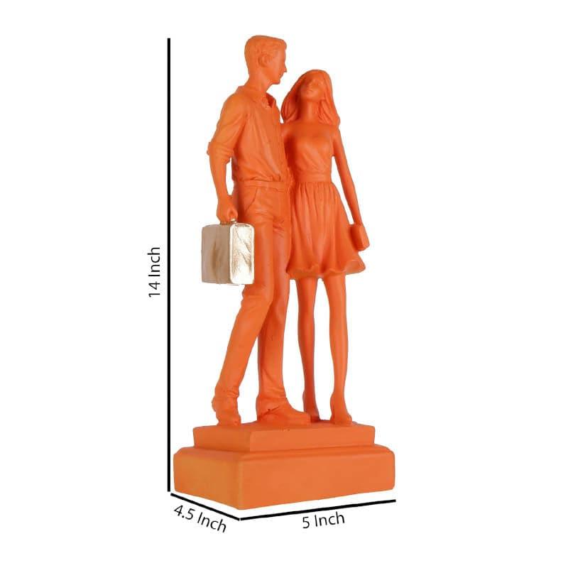 Buy Let's Go Shopping Couple Showpiece - Orange Showpieces from Vaaree