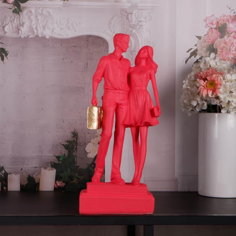 Buy Let's Go Shopping Couple Showpiece - Pink Showpieces from Vaaree