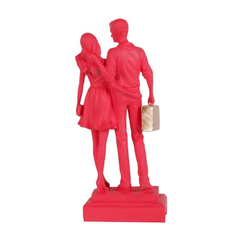 Buy Let's Go Shopping Couple Showpiece - Pink Showpieces from Vaaree