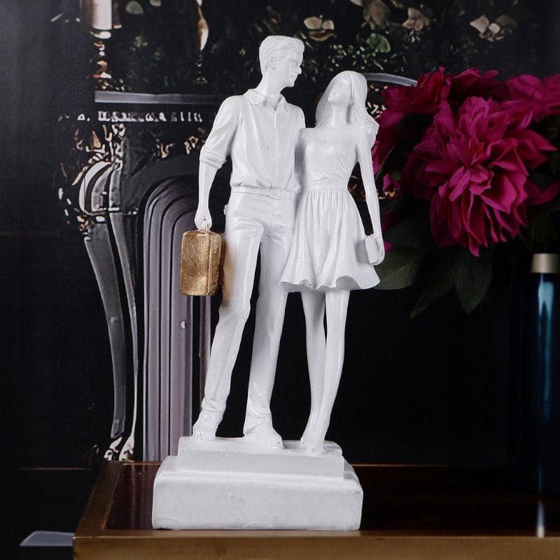 Buy Let's Go Shopping Couple Showpiece - White Showpieces from Vaaree