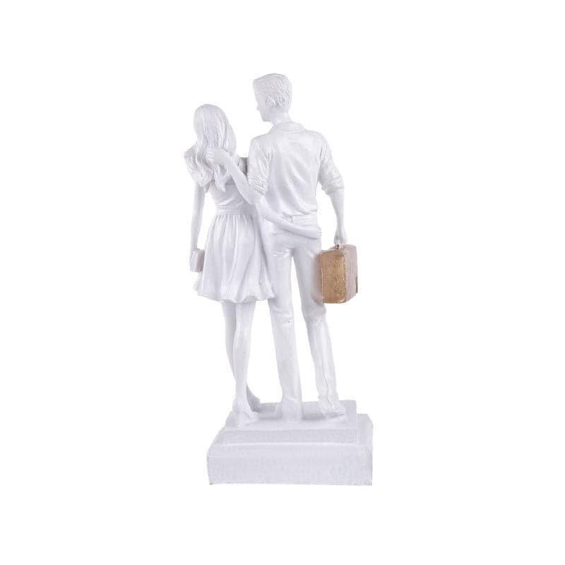 Buy Let's Go Shopping Couple Showpiece - White Showpieces from Vaaree