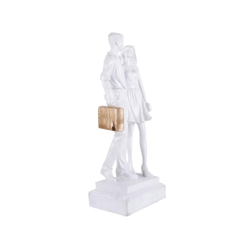 Buy Let's Go Shopping Couple Showpiece - White Showpieces from Vaaree