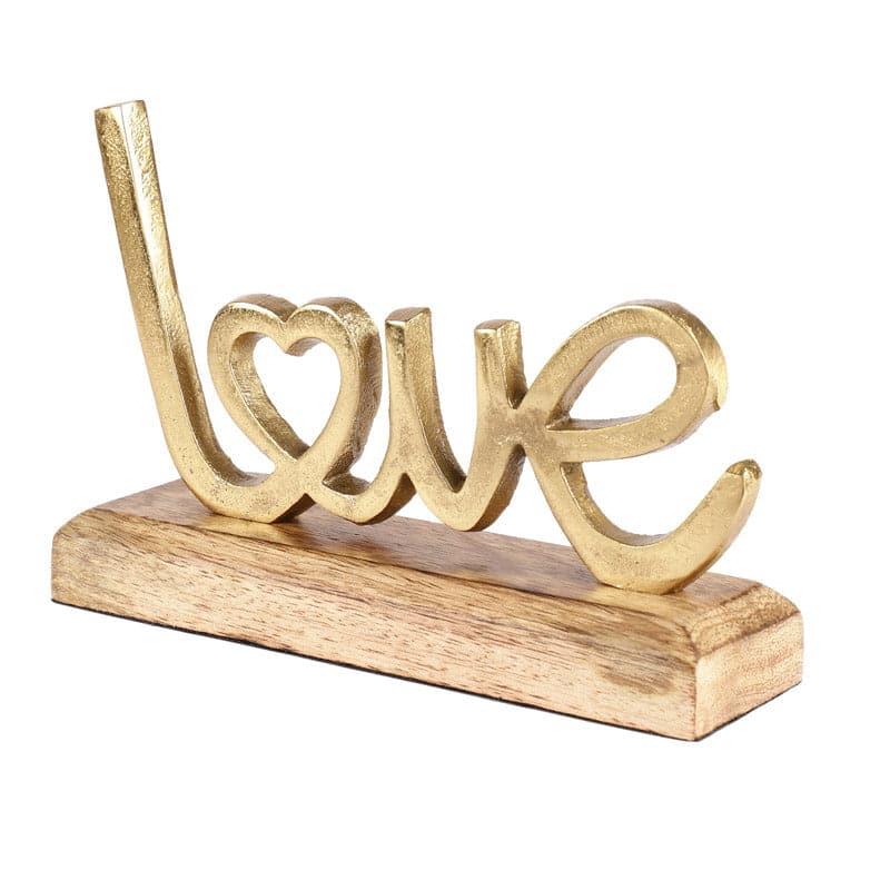 Buy Love Loop Typography Showpiece - Gold Showpieces from Vaaree