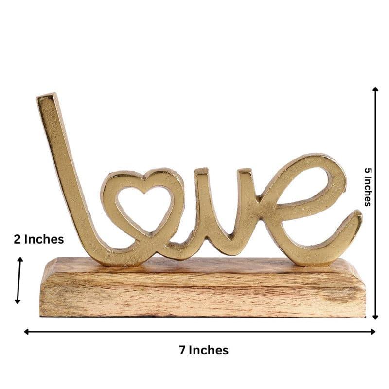 Buy Love Loop Typography Showpiece - Gold Showpieces from Vaaree