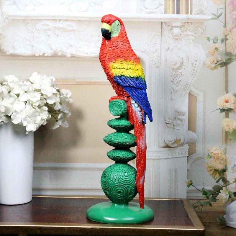 Buy Parrot Whistle Showpiece - Red Showpieces from Vaaree