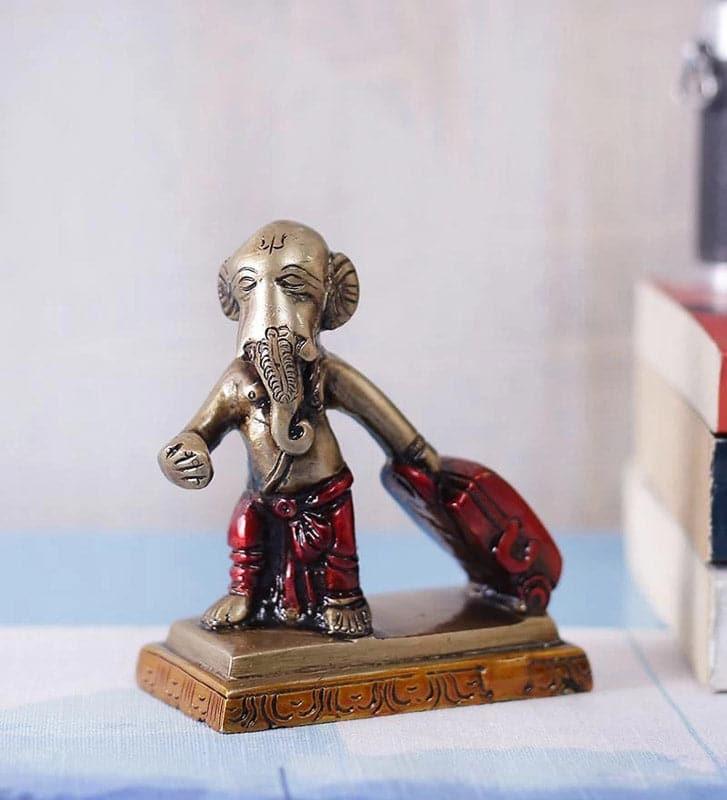 Buy Playful Ganesha Showpiece Showpieces from Vaaree