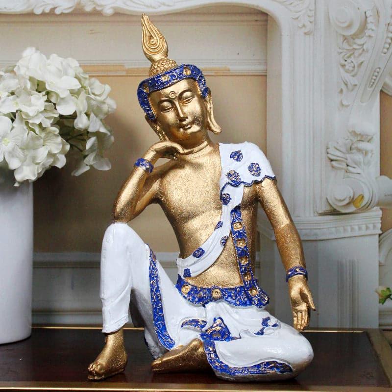 Buy Pondering Buddha Showpiece - Blue & White Showpieces from Vaaree