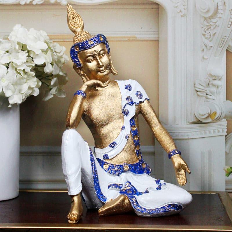 Buy Pondering Buddha Showpiece - Blue & White Showpieces from Vaaree