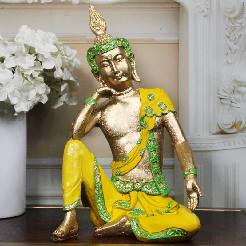 Buy Pondering Buddha Showpiece - Yellow & Green Showpieces from Vaaree