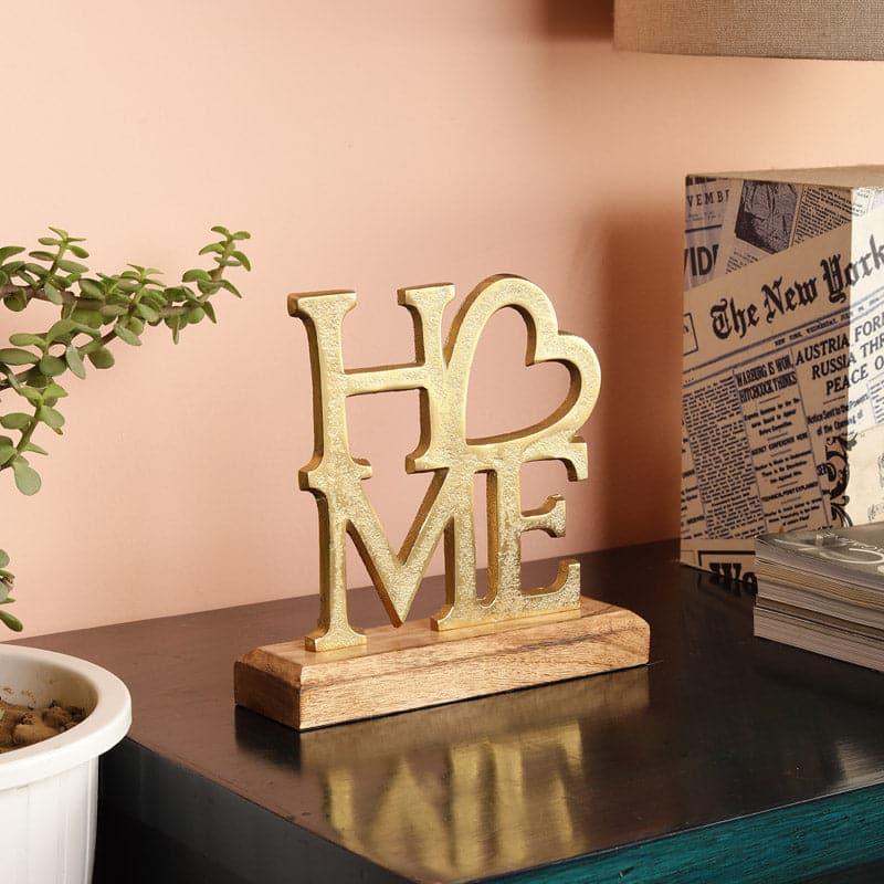 Buy Serene Home Typography Showpiece - Gold Showpieces from Vaaree