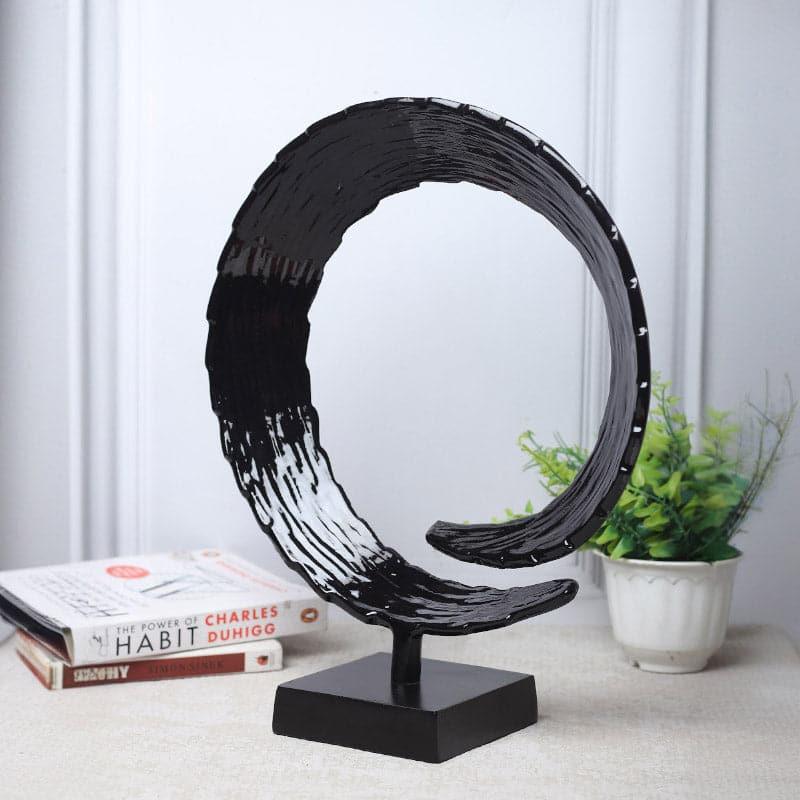 Buy Serene Spiral Showpiece - Black Showpiece from Vaaree