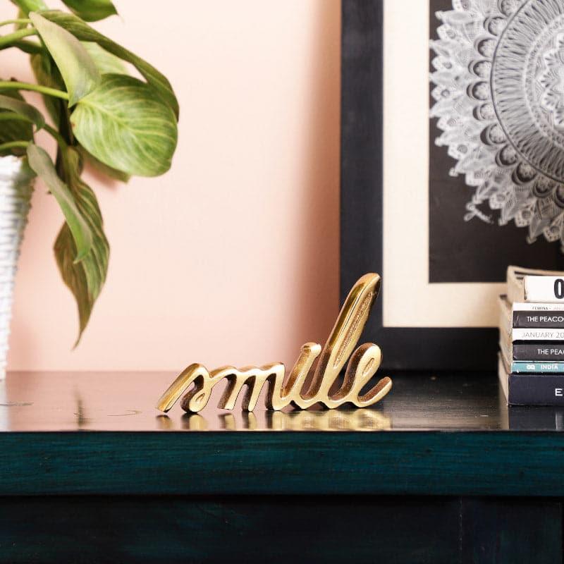 Buy Smile Typography Showpiece - Gold Showpieces from Vaaree