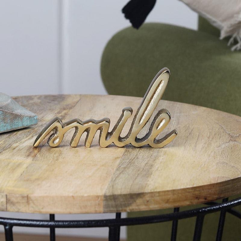 Buy Smile Typography Showpiece - Gold Showpieces from Vaaree