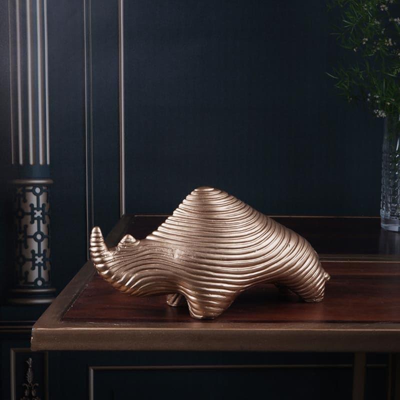 Buy Tomby Rhino Showpiece - Gold Showpieces from Vaaree