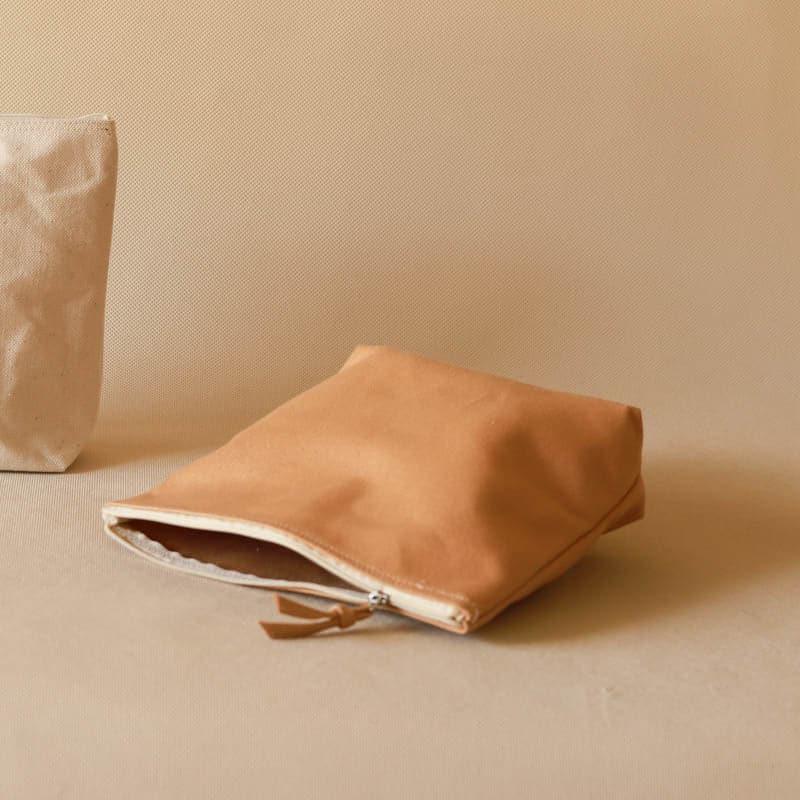 Buy Zane Bun Pouch - Tan Storage Pouch from Vaaree